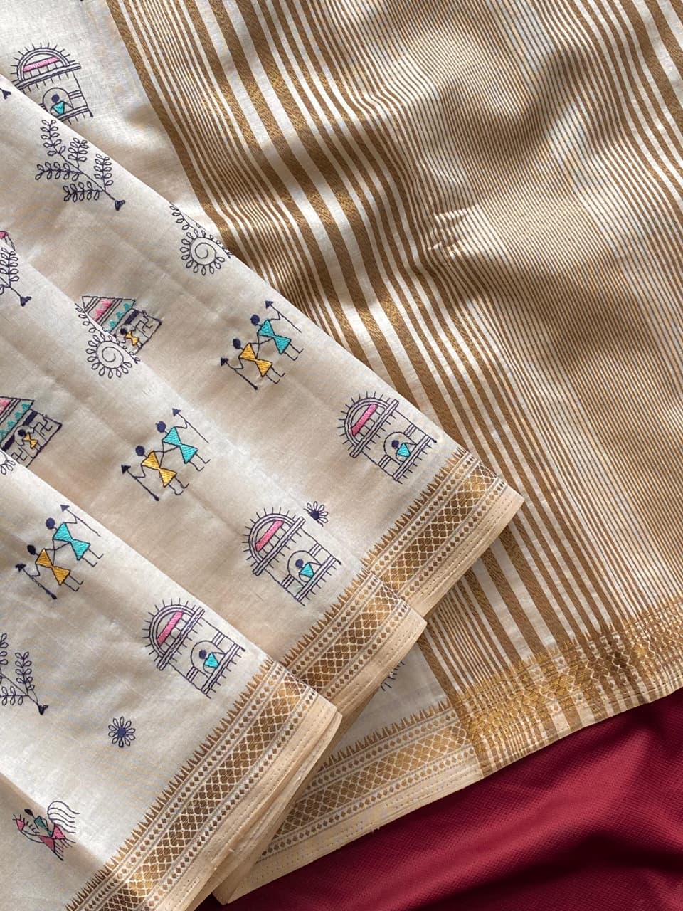 Pure Loom Tussar Saree With All Over Worli Embroidery Pattern & Copper Zari Border