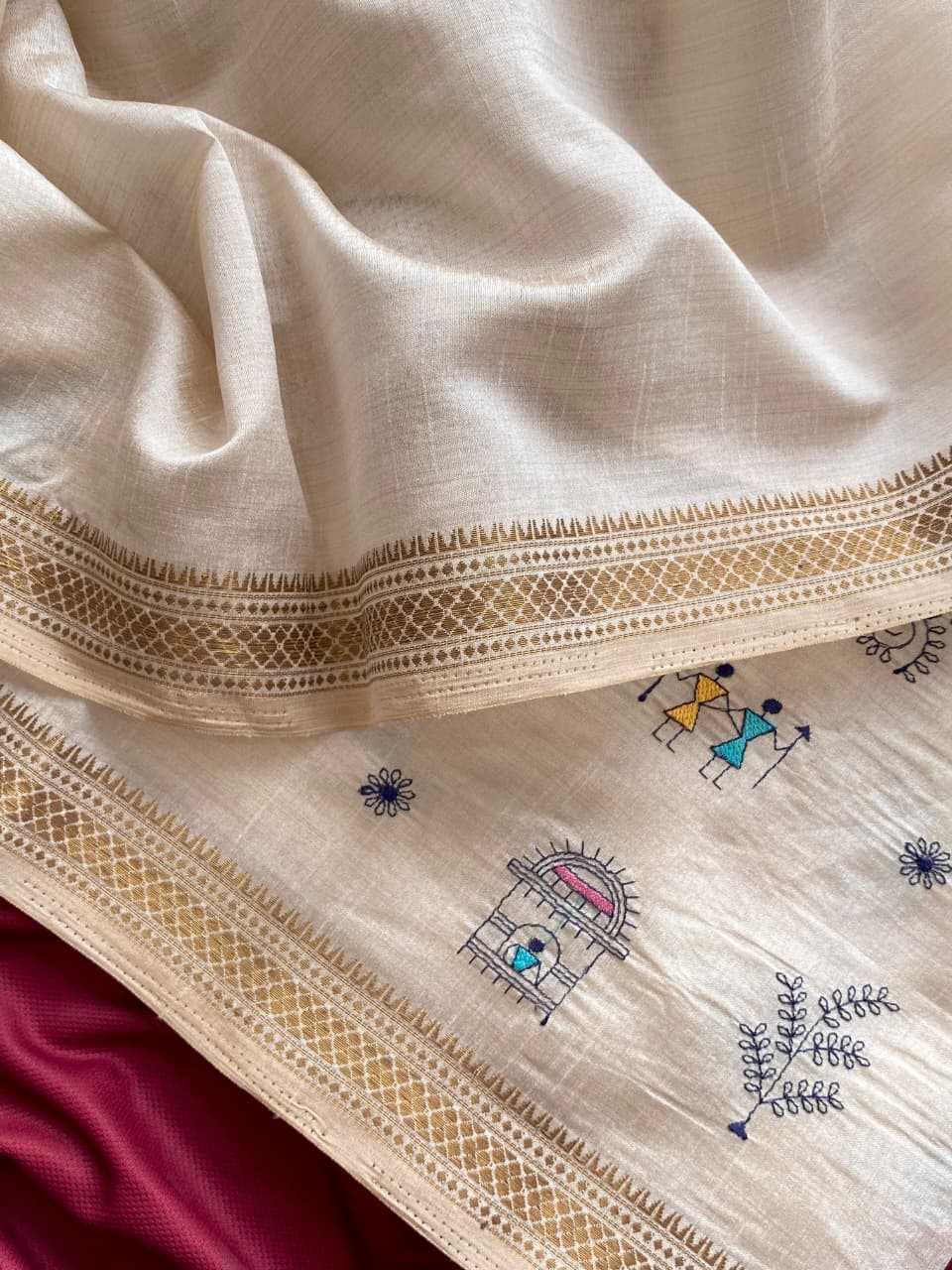 Pure Loom Tussar Saree With All Over Worli Embroidery Pattern & Copper Zari Border