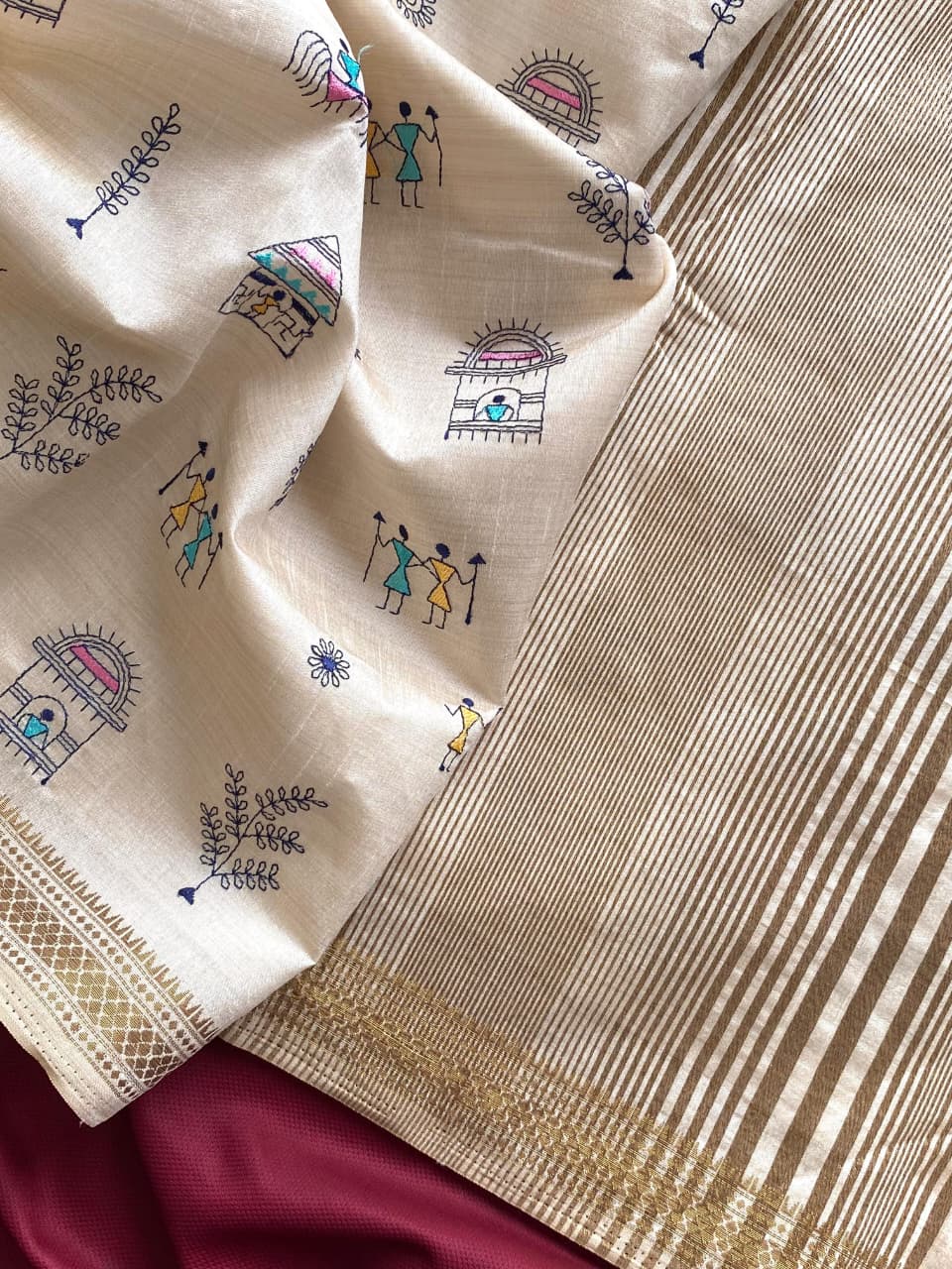 Pure Loom Tussar Saree With All Over Worli Embroidery Pattern & Copper Zari Border